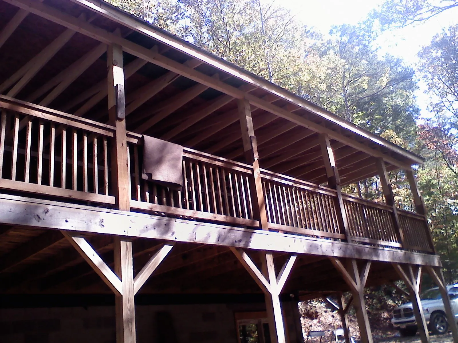 Timber framing under a new elevated porch and deck — Roof Leak Repair in Davisburg by Roofing Brothers